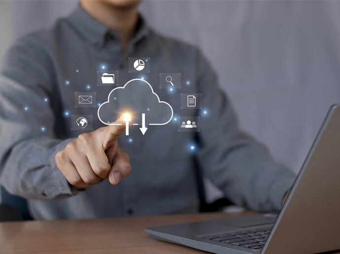 Man pointing to laptop screen